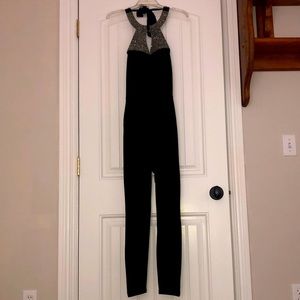 Black bodycon jumpsuit. Size XS/S